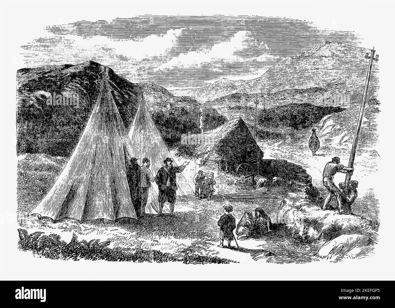 The camp of workers in the 19th century erecting poles for the Telegraph Company on the road between Killarney and Valencia, County Kerry, Ireland. Stock Photo