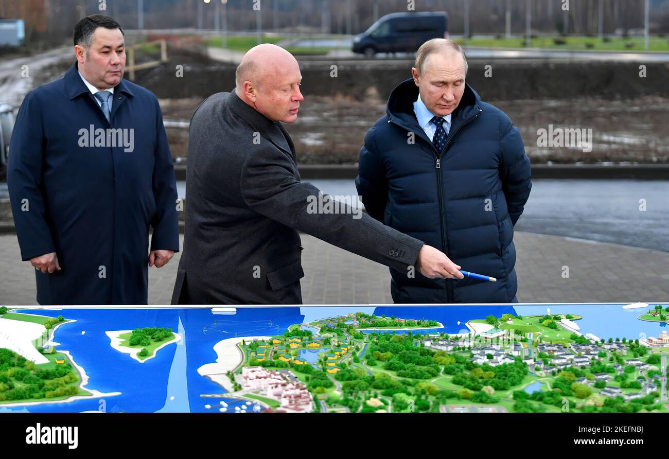 Vladimir Putin examines the site and models of construction projects at the Volzhskoye More tourist and recreation cluster. With Tver Region Governor Igor Rudenya and Vasta Discovery General Director Sergei Bachin.Photo:Russia President's Office Stock Photo