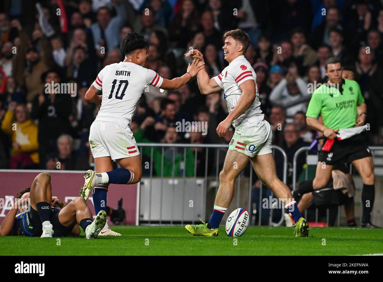 Guy Porter of England celebrates his try during the Autumn