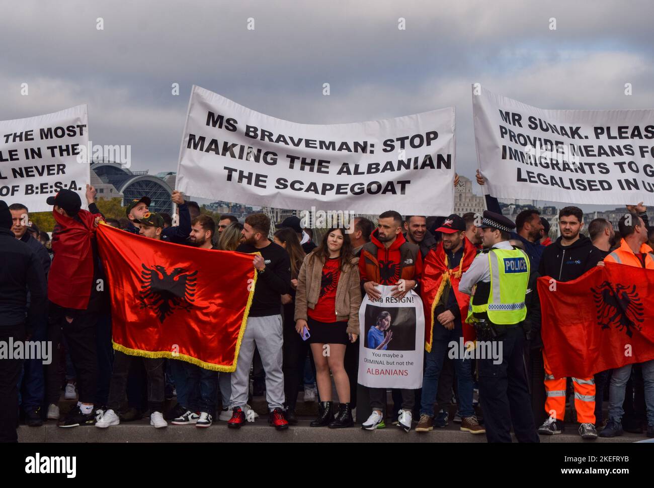 November 12, 2022, London, England, United Kingdom: Protesters on Westminster Bridge. Albanians gathered in Westminster in protest against Home Secretary Suella Braverman after she stated that there was an 'invasion' of migrants in the UK and that criminal gangs from Albania are abusing the British immigration system. (Credit Image: © Vuk Valcic/ZUMA Press Wire) Stock Photo