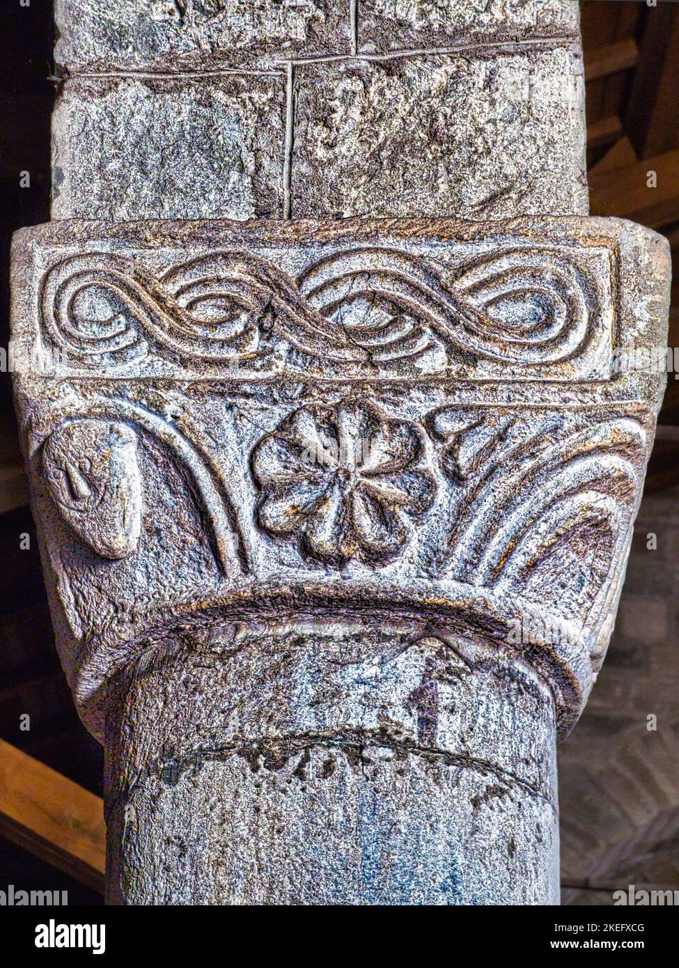 Romanesque capital characterized by typical High Middle Age figures and symbols. St. Paul's Church near Fivizzano town in Lunigiana, Tuscany, Italy. Stock Photo