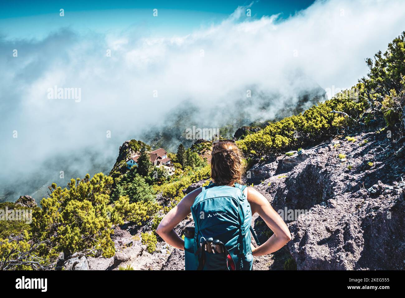 Premium Photo  Real hikers with a backpack on the trail mountain panorama  in spring or summer stones and grass