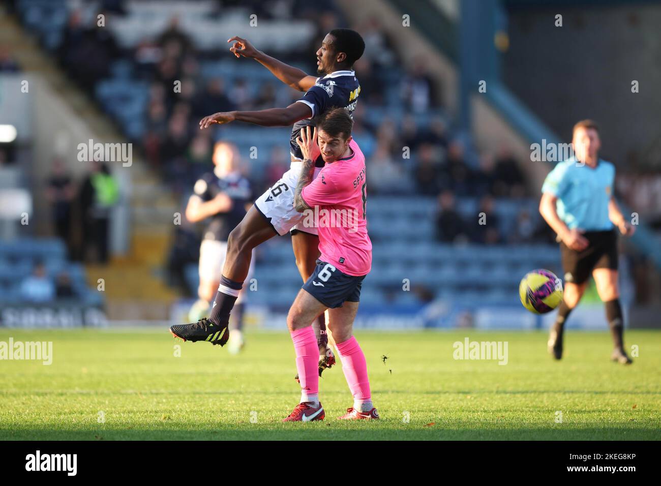 Dundee, Scotland, UK. 12th November 2022; Dens Park, Dundee, Scotland: Scottish Championship football, Dundee versus Raith Rovers; Zach Robinson of Dundee competes in the air with Brad Spencer of Raith Rovers Credit: Action Plus Sports Images/Alamy Live News Stock Photo