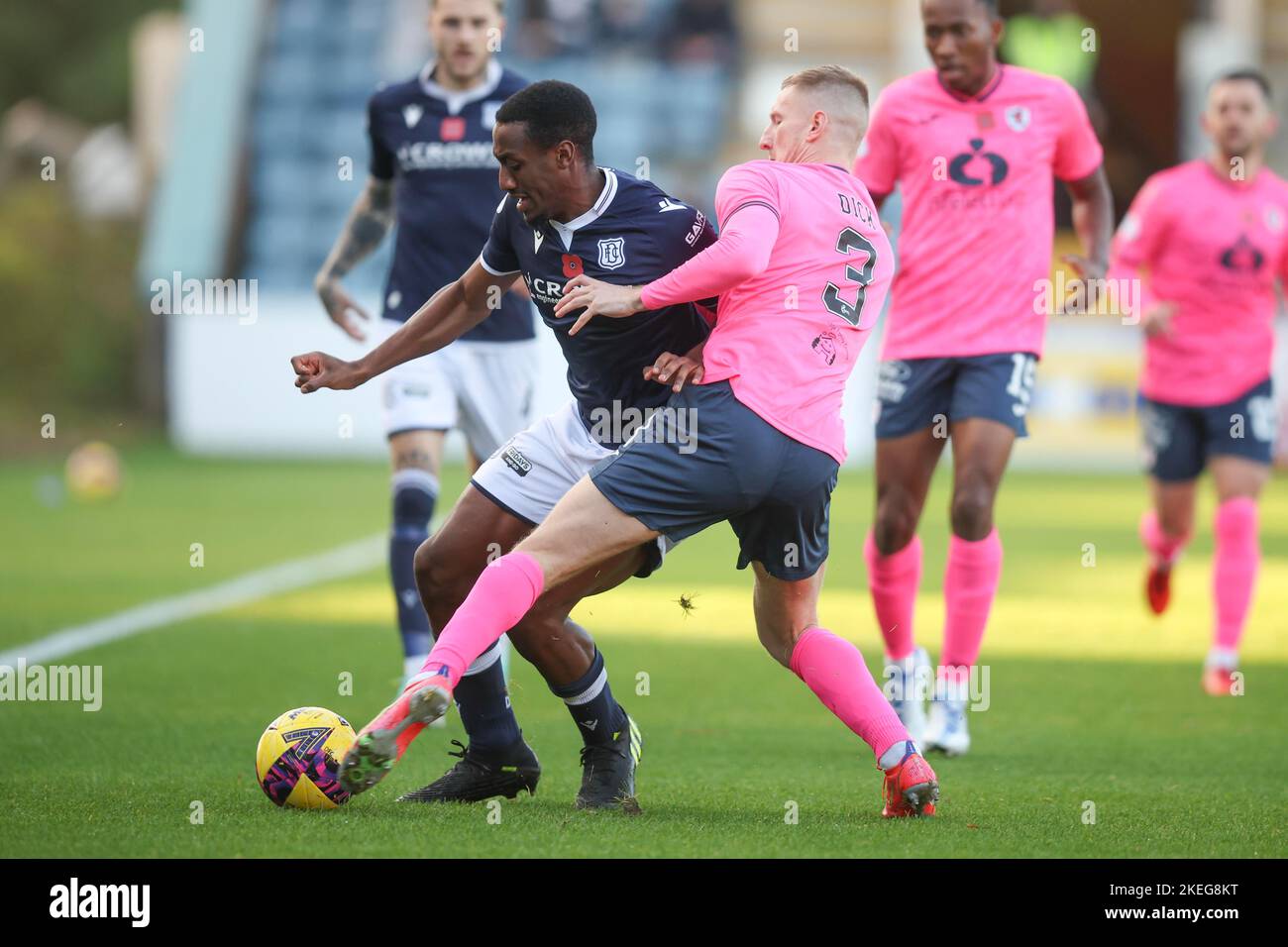 Dundee, Scotland, UK. 12th November 2022; Dens Park, Dundee, Scotland: Scottish Championship football, Dundee versus Raith Rovers; Zach Robinson of Dundee takes on Liam Dick of Raith Rovers Credit: Action Plus Sports Images/Alamy Live News Stock Photo