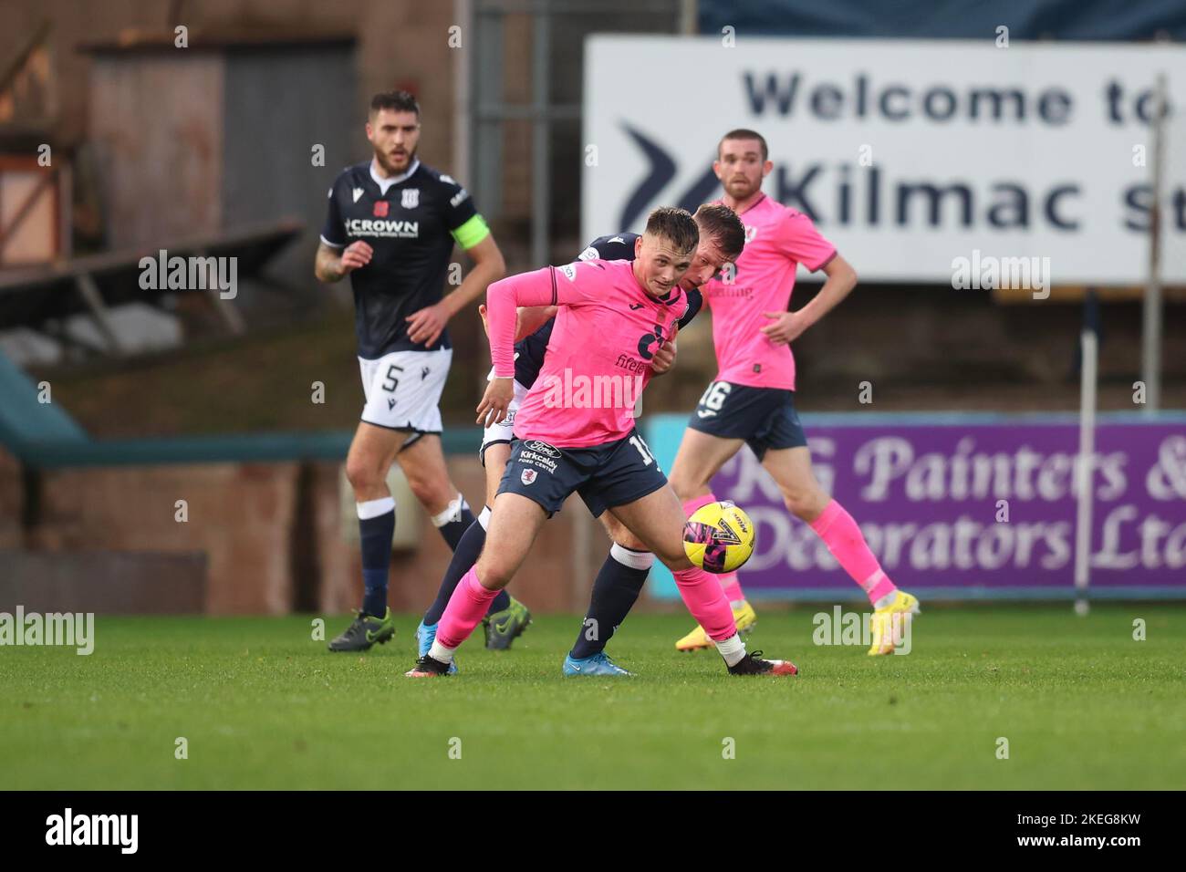 Dundee, Scotland, UK. 12th November 2022;  Dens Park, Dundee, Scotland: Scottish Championship football, Dundee versus Raith Rovers; Lee Ashcroft of Dundee challenges for the ball with Kyle Connell of Raith Rovers Credit: Action Plus Sports Images/Alamy Live News Stock Photo
