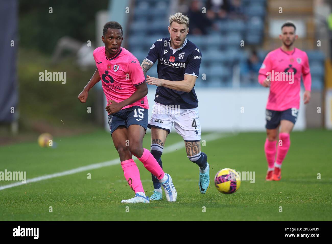Dundee, Scotland, UK. 12th November 2022; Dens Park, Dundee, Scotland: Scottish Championship football, Dundee versus Raith Rovers; Kieran Ngwenya of Raith Rovers challenges for the ball with Tyler French of Dundee Credit: Action Plus Sports Images/Alamy Live News Stock Photo