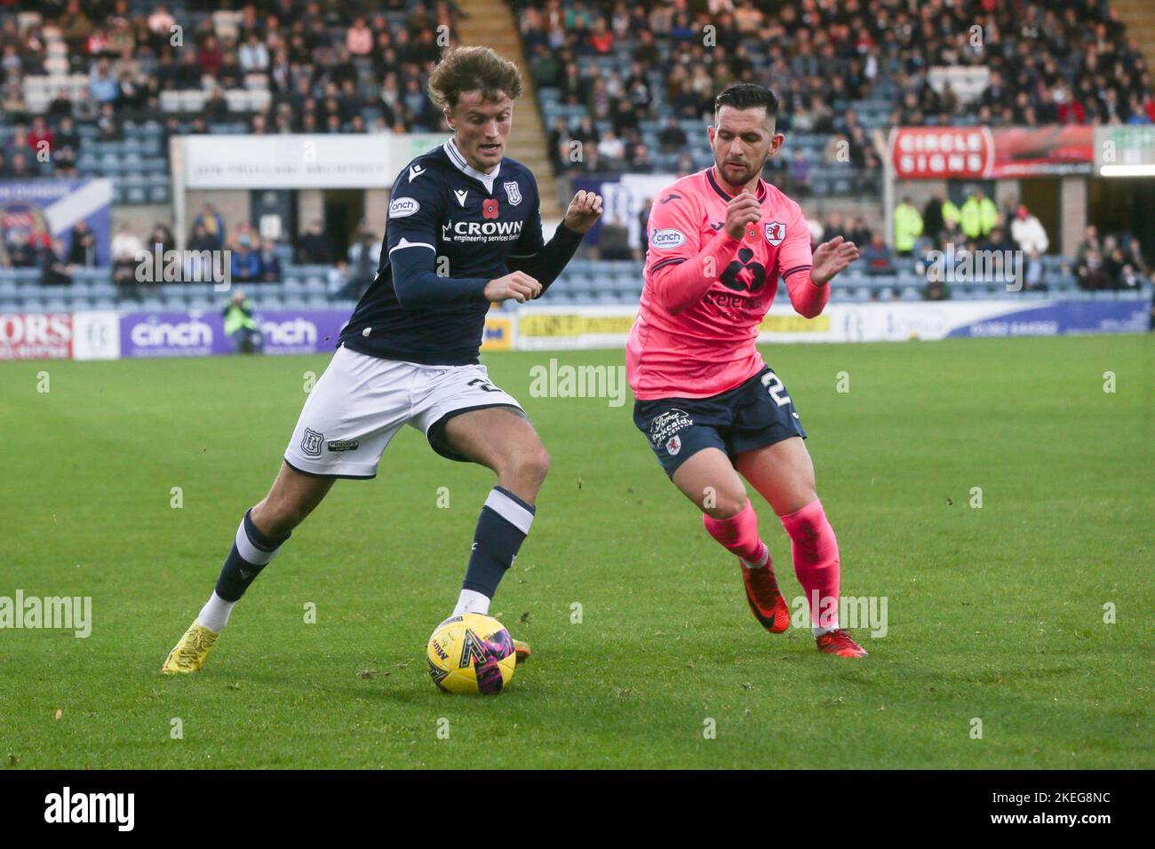 Dundee, Scotland, UK. 12th November 2022;  Dens Park, Dundee, Scotland: Scottish Championship football, Dundee versus Raith Rovers; Ben Williamson of Dundee takes on Dylan Easton of Raith Rovers Credit: Action Plus Sports Images/Alamy Live News Stock Photo