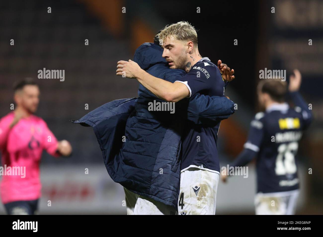 Dundee, Scotland, UK. 12th November 2022;  Dens Park, Dundee, Scotland: Scottish Championship football, Dundee versus Raith Rovers; Tyler French of Dundee celebrates at the end of the match with Zach Robinson Credit: Action Plus Sports Images/Alamy Live News Stock Photo