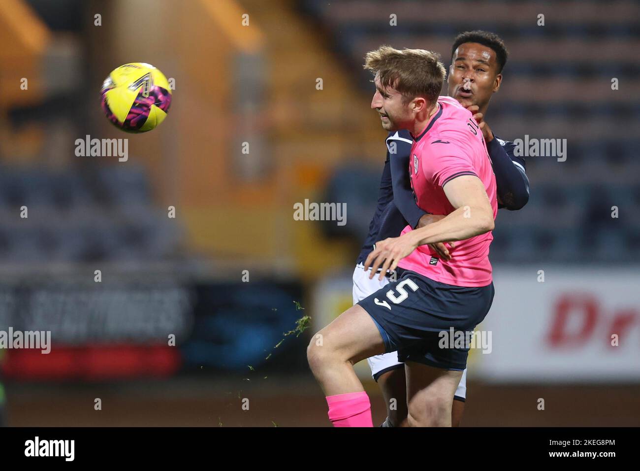 Dundee, Scotland, UK. 12th November 2022; Dens Park, Dundee, Scotland: Scottish Championship football, Dundee versus Raith Rovers; Ryan Nolan of Raith Rovers competes in the air with Derick Osei of Dundee Credit: Action Plus Sports Images/Alamy Live News Stock Photo