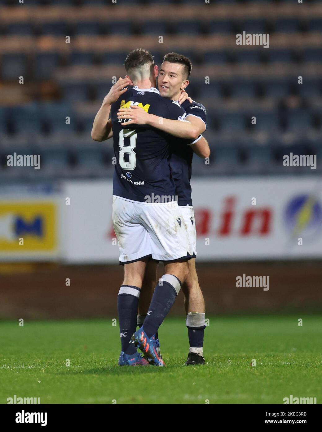 Dundee, Scotland, UK. 12th November 2022; Dens Park, Dundee, Scotland: Scottish Championship football, Dundee versus Raith Rovers; Cammy Kerr of Dundee celebrates at the end of the match with Shaun Byrne Credit: Action Plus Sports Images/Alamy Live News Stock Photo