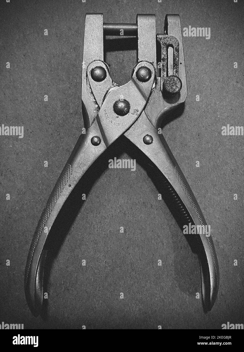 Vintage Metal Hole Puncher Stock Photo