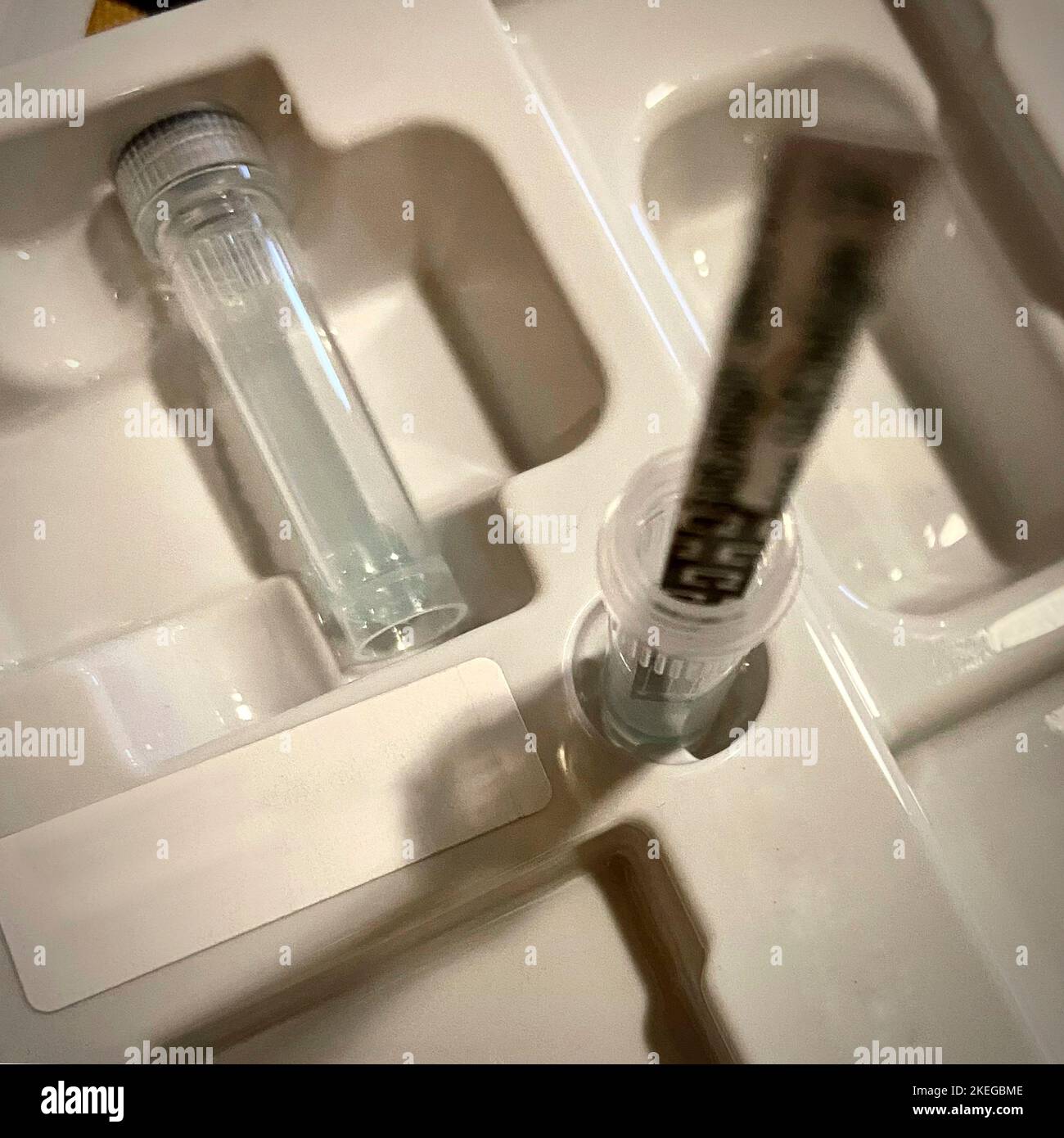COVID-19 Home Testing Kit in Use Stock Photo - Alamy
