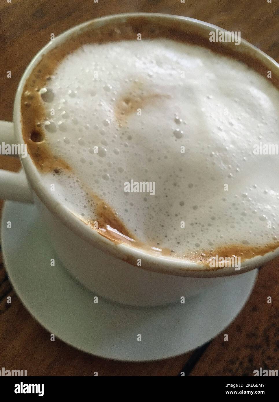 High Angle View of Frothy Cappuccino Stock Photo