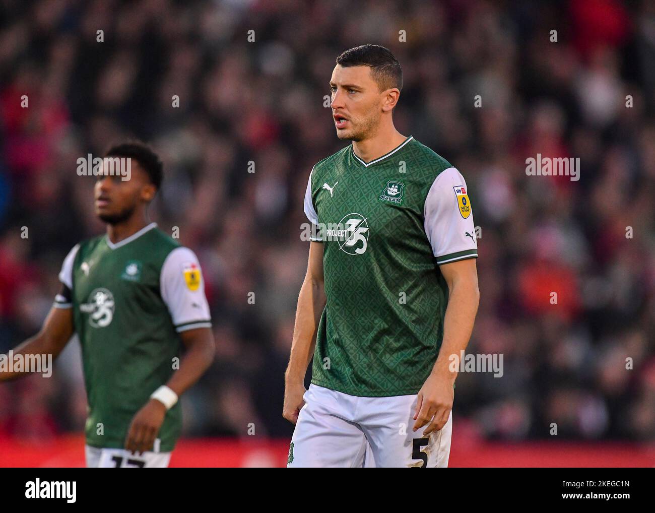 Lincoln, UK. 12th Nov, 2022. Plymouth Argyle defender James Wilson (5) during the Sky Bet League 1 match Lincoln City vs Plymouth Argyle at Gelder Group Sincil Bank Stadium, Lincoln, United Kingdom, 12th November 2022 (Photo by Stanley Kasala/News Images) in Lincoln, United Kingdom on 11/12/2022. (Photo by Stanley Kasala/News Images/Sipa USA) Credit: Sipa USA/Alamy Live News Stock Photo