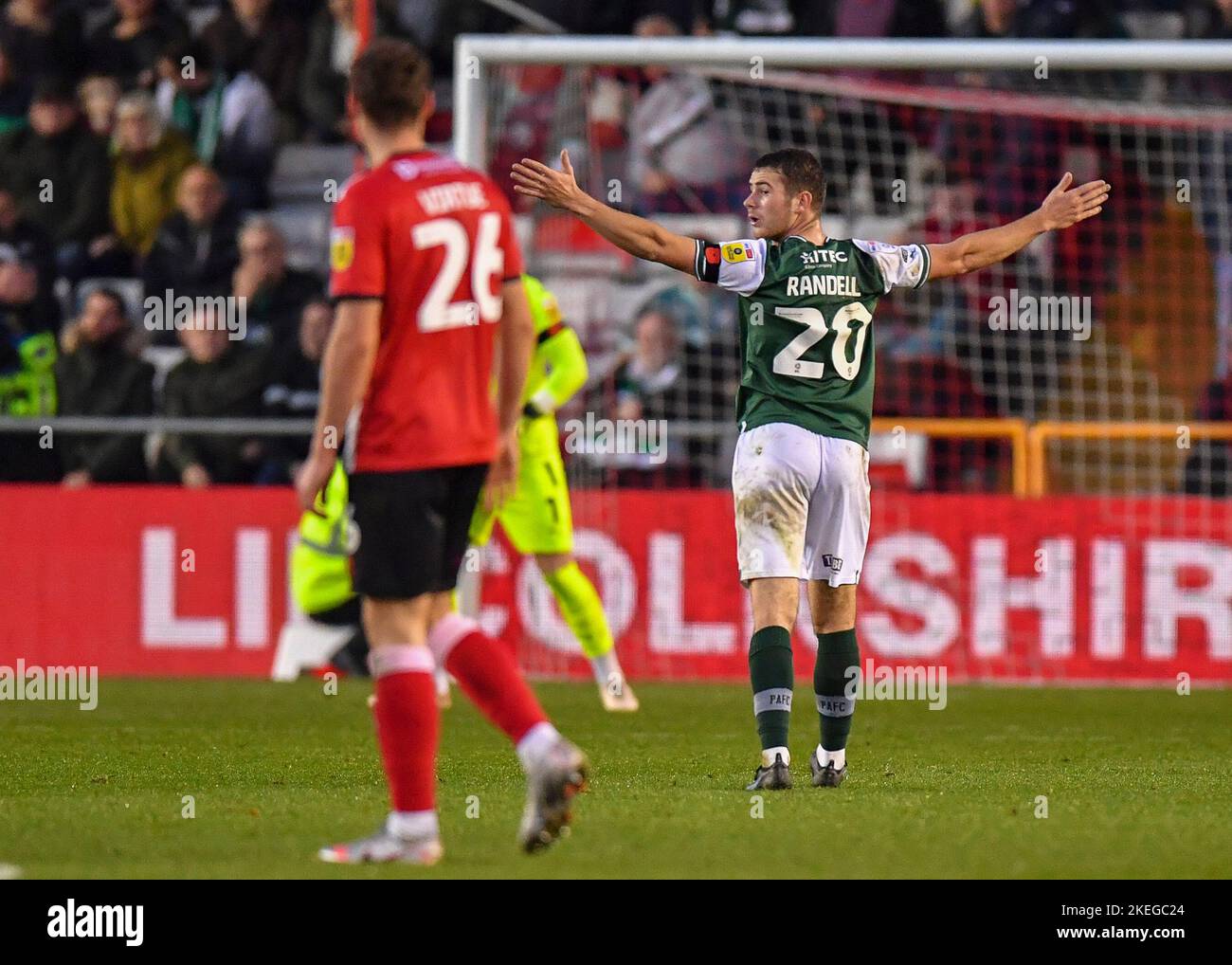 Lincoln, UK. 12th Nov, 2022. Plymouth Argyle midfielder Adam Randell (20) during the Sky Bet League 1 match Lincoln City vs Plymouth Argyle at Gelder Group Sincil Bank Stadium, Lincoln, United Kingdom, 12th November 2022 (Photo by Stanley Kasala/News Images) in Lincoln, United Kingdom on 11/12/2022. (Photo by Stanley Kasala/News Images/Sipa USA) Credit: Sipa USA/Alamy Live News Stock Photo