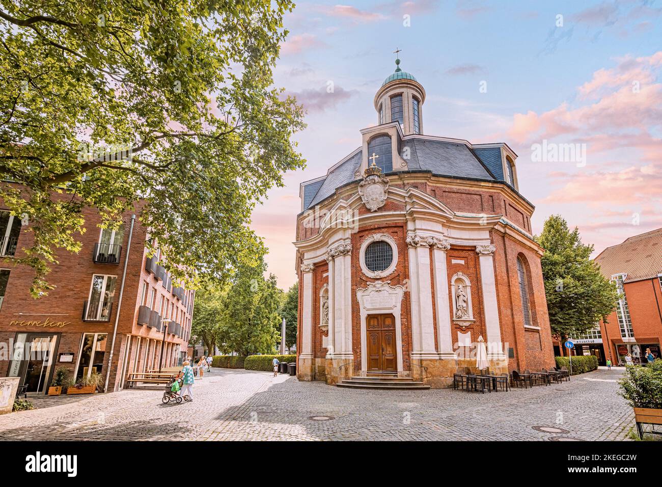 25 July 2022, Munster, Germany: Famous Clemenskirche or Clemens Church in Muenster city. Sightseeing and religious tourism landmarks Stock Photo