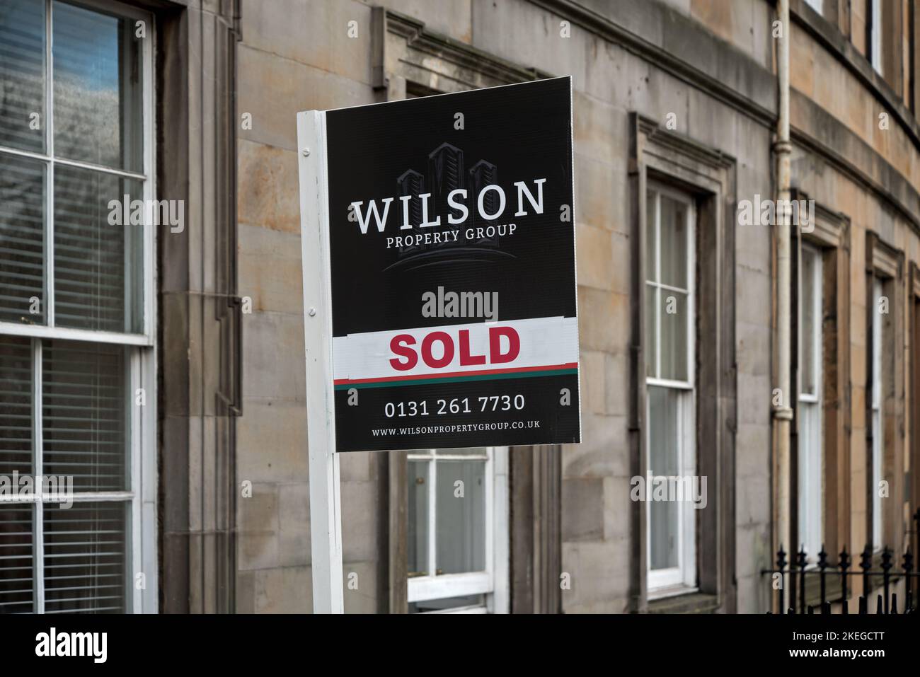 Wilson Property Group, estate agents sign with sold sticker on a property in Edinburgh's West End. Stock Photo