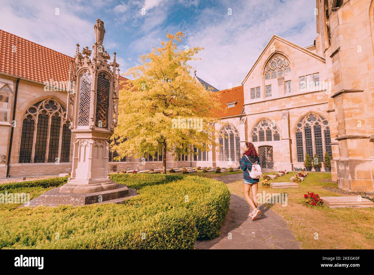 25 July 2022, Munster, Germany A tourist girl walks through the