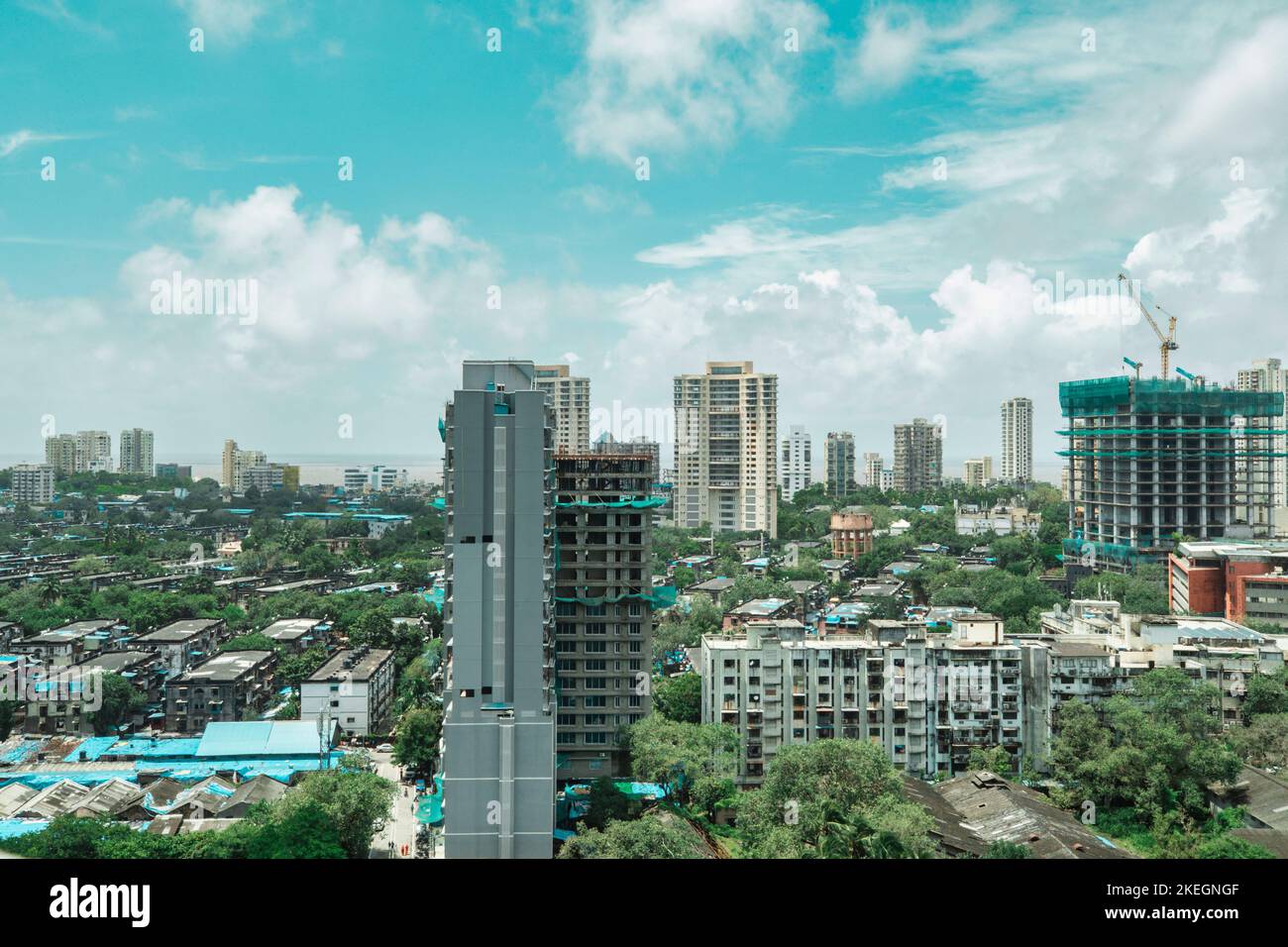 A scenic shot of high buildings with clouds in the sky in Mumbai, India ...