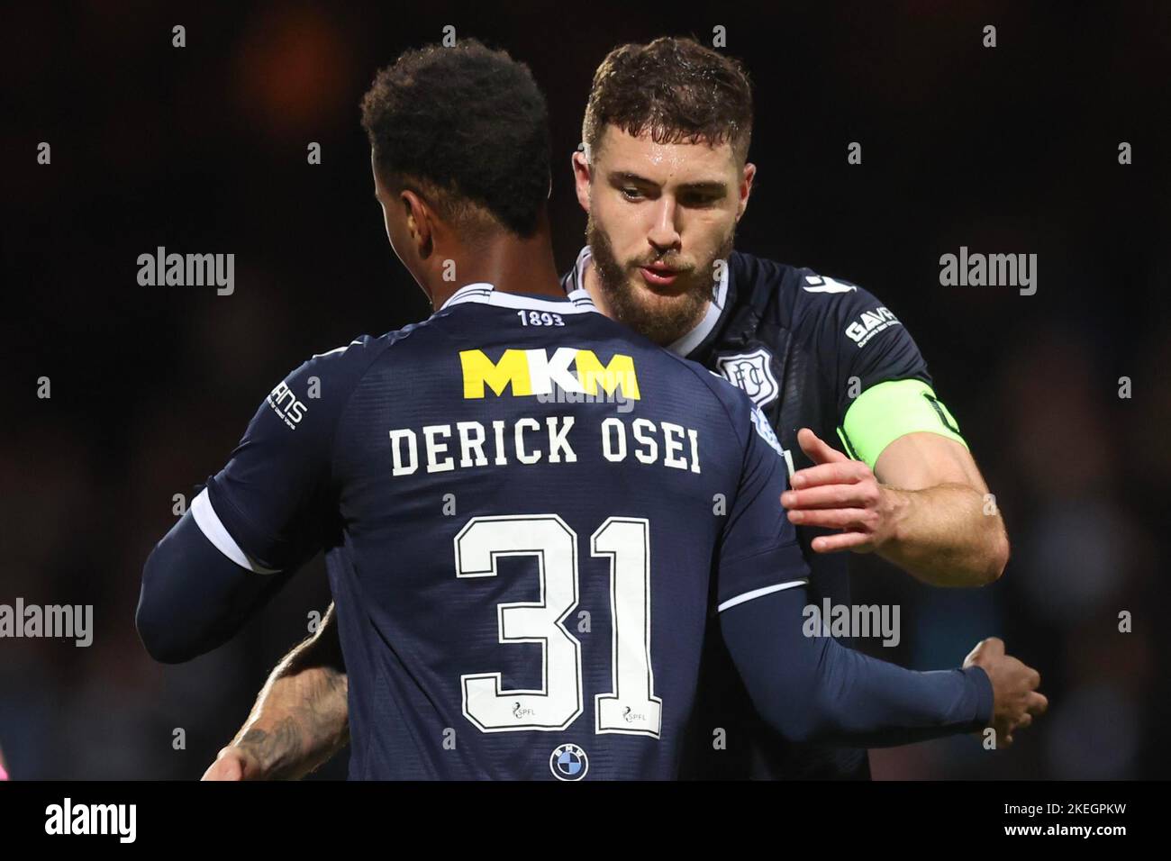 Dundee, Scotland, UK. 12th November 2022; Dens Park, Dundee, Scotland: Scottish Championship football, Dundee versus Raith Rovers; Ryan Sweeney of Dundee celebrates at the end of the match with Derick Osei Credit: Action Plus Sports Images/Alamy Live News Stock Photo