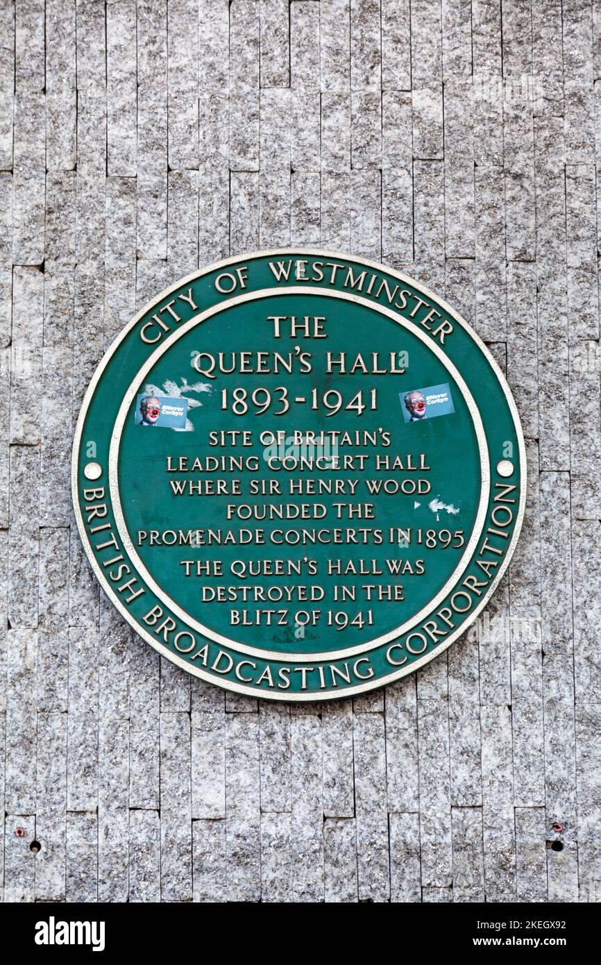 Green plaque for The Queen's Hall in Langham Place, Henry Wood House, London, UK Stock Photo