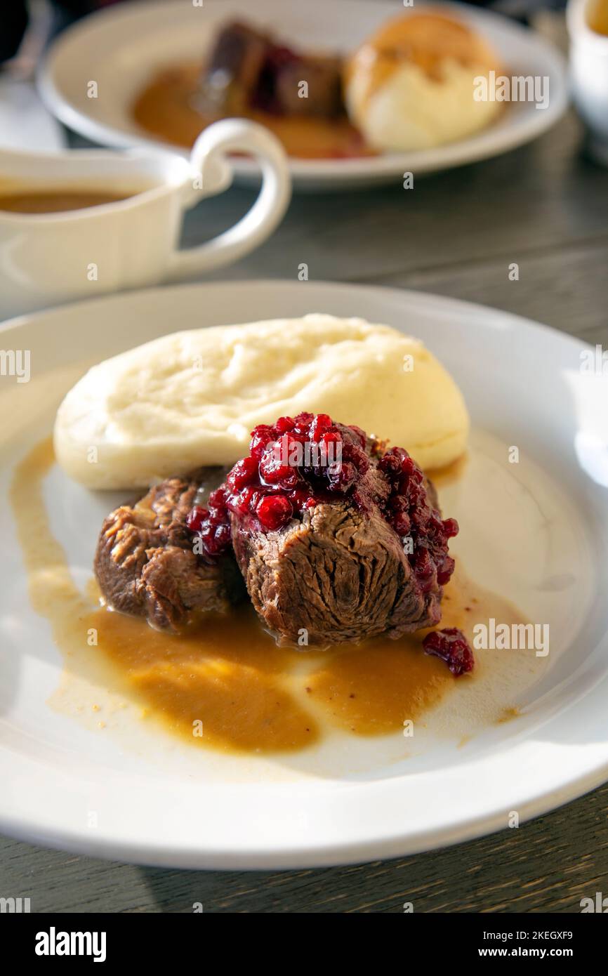 Beef shank with Czech break dumpling at Kuchyň restaurant, Prague, Czech Republic Stock Photo