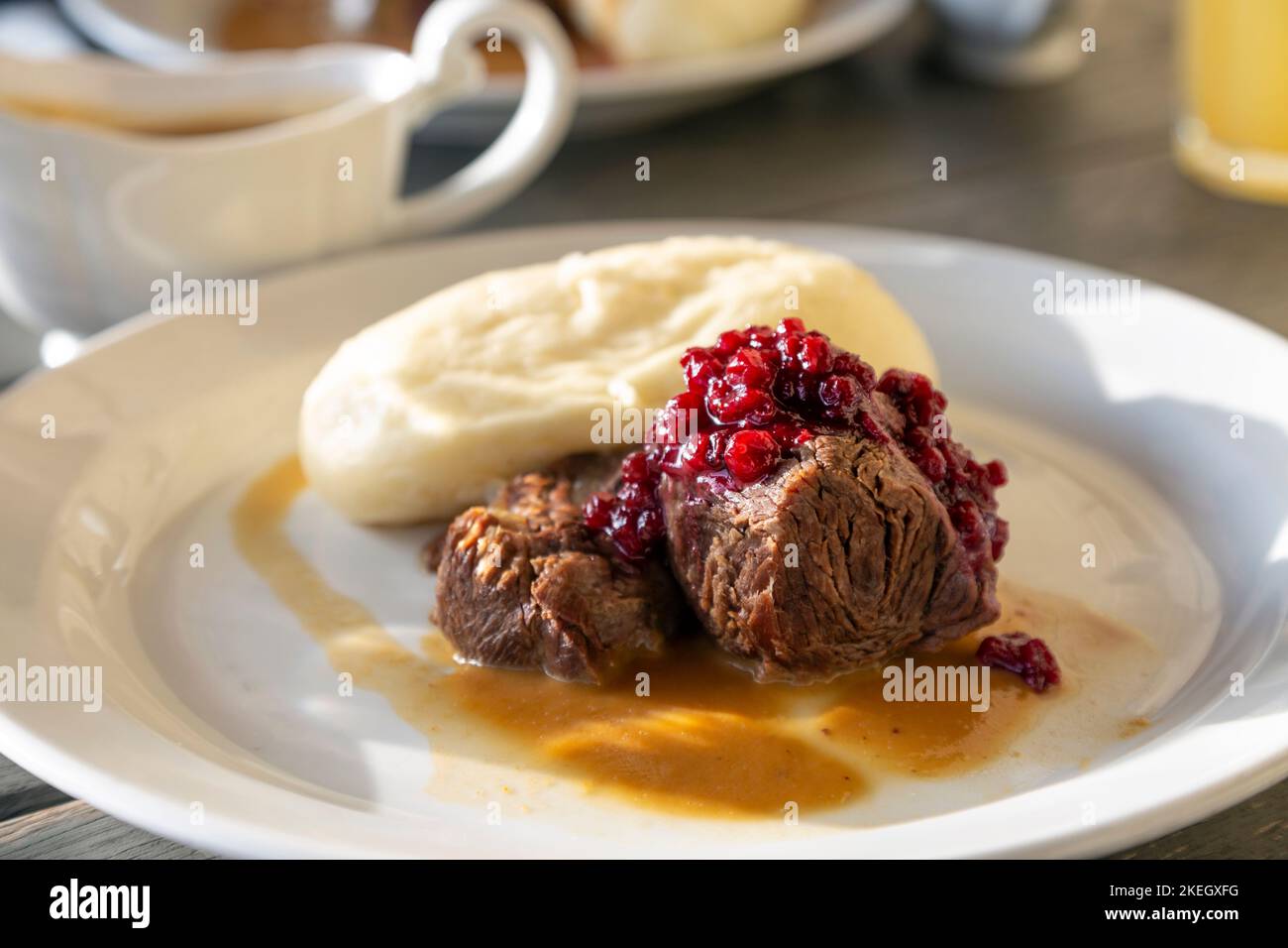 Beef shank with Czech break dumpling at Kuchyň restaurant, Prague, Czech Republic Stock Photo