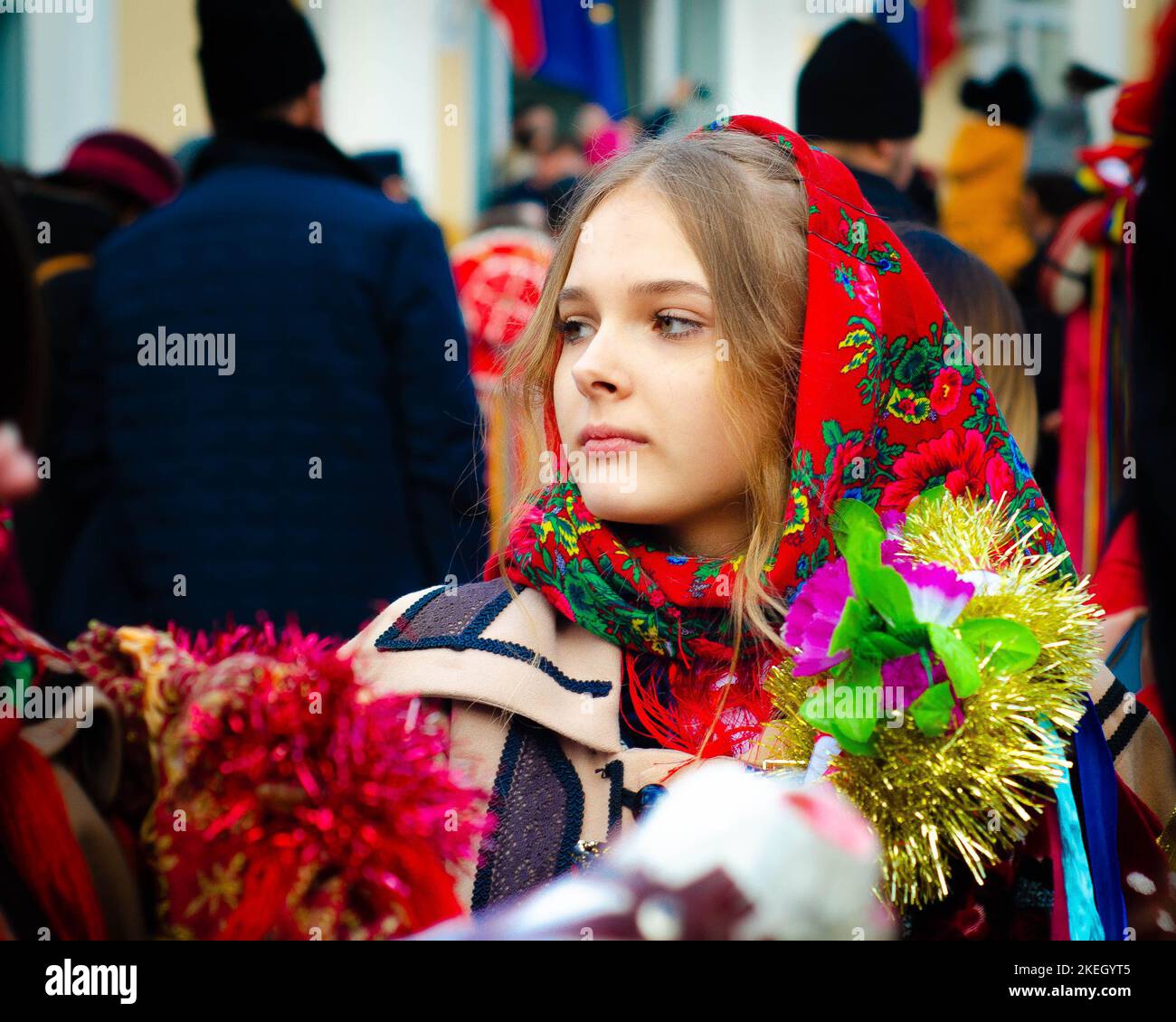 Beautiful smiling girl in traditional Romanian clothes at the annual