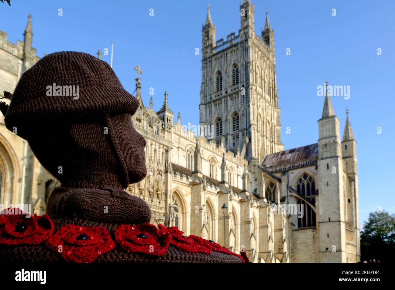 Hand knitted Post Box topper for Remembrance Day outside glos Cathedral