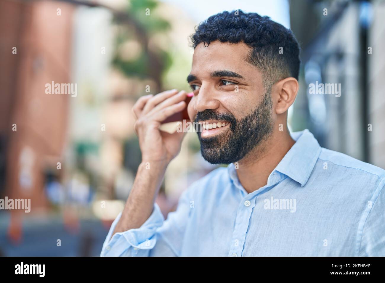 Young arab man miling confident hi-res stock photography and images - Alamy