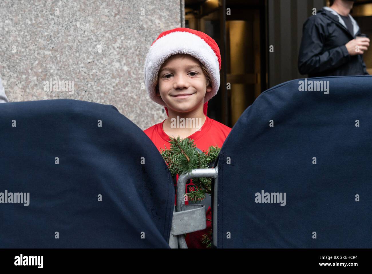 7year old Charlie Milone from Long Island watches as 2022 Rockefeller Center Christmas Tree, an