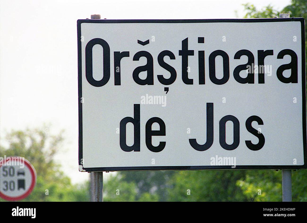 Hunedoara County, Romania, 2000. Sign at the entrance in the village of Orastioara de Jos. Stock Photo