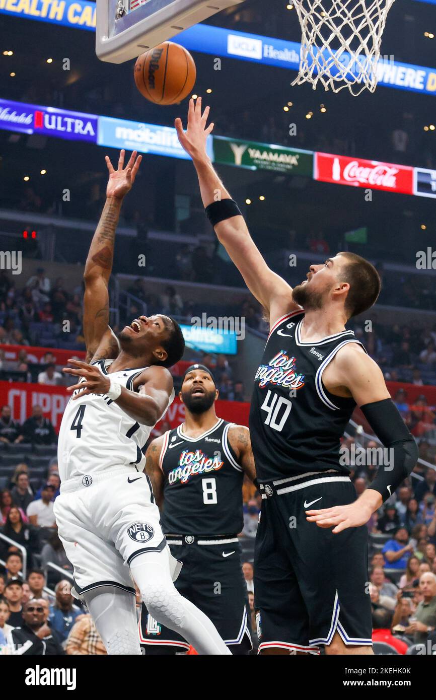 Los Angeles, California, USA. 12th Nov, 2022. Brooklyn Nets guard Edmond  Summer (4) goes up to basket under pressure from Los Angeles Clippers  center Ivica Zubac (40) during an NBA basketball game