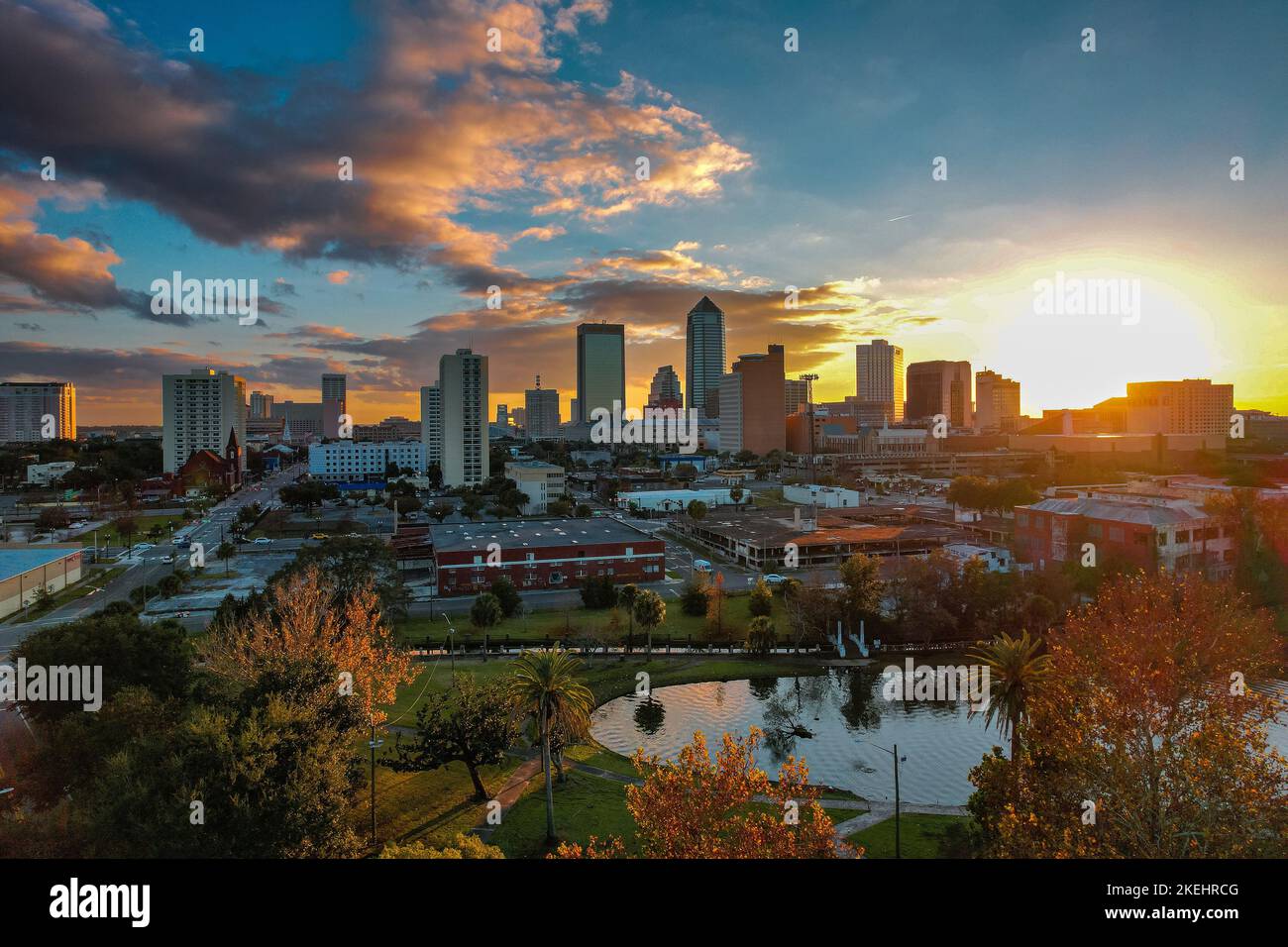 Jackson Sc The Jacksonville cityscape with greenery and a reflective lake during ...