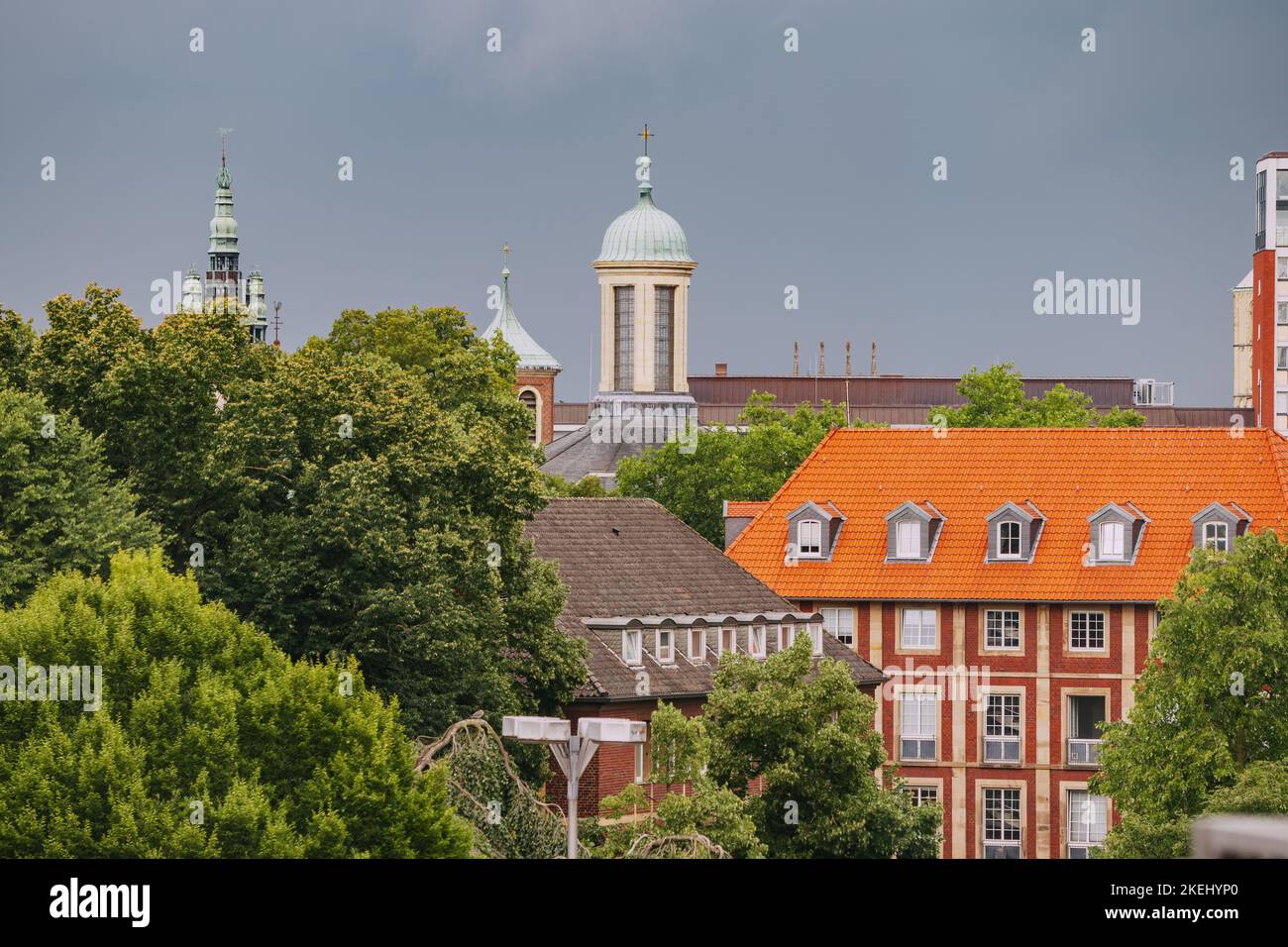 View of the orange roofs of the old European city. Tourism and real estate in Munster, Germany concept. Stock Photo