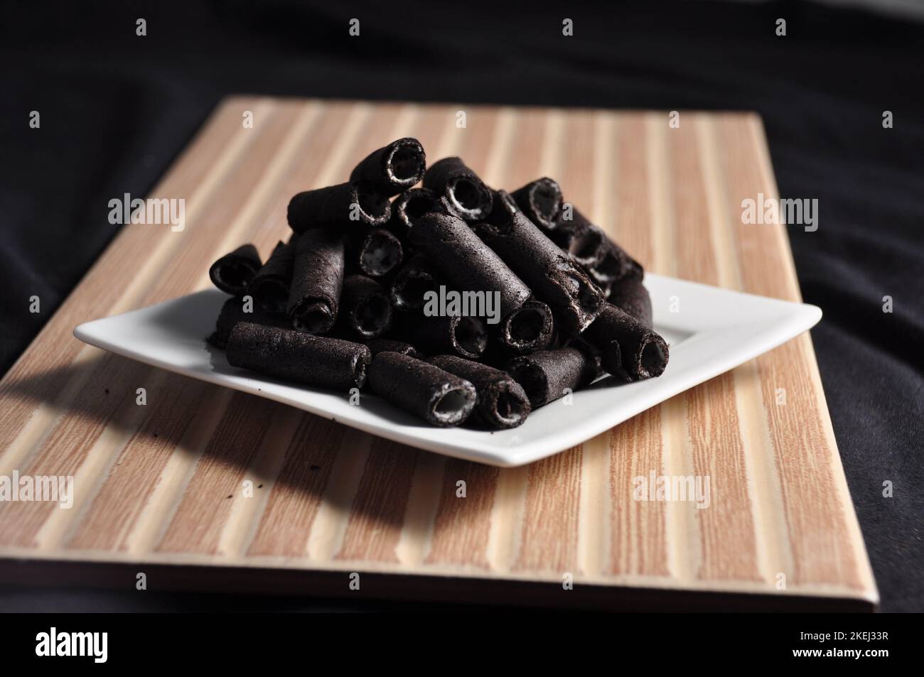 Vanilla wafer sticks on a plate Stock Photo