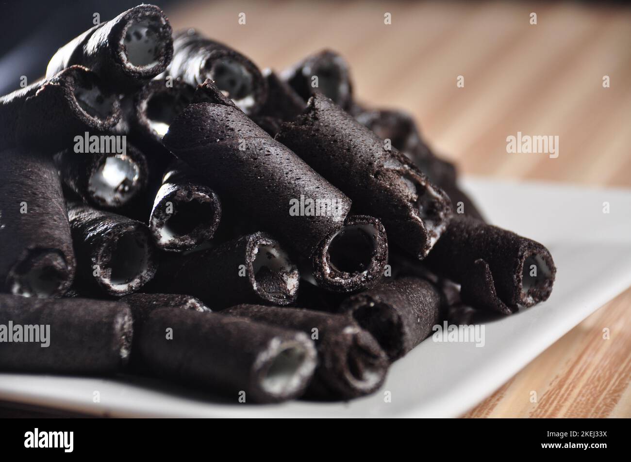 Vanilla wafer sticks on a plate Stock Photo