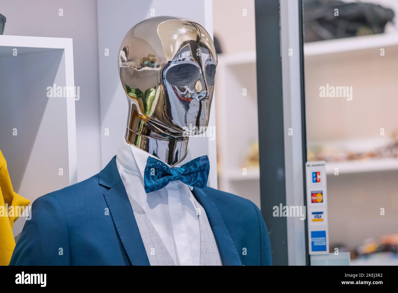 26 July 2022, Munster, Germany: Men suit with bow tie on a mannequin in ...