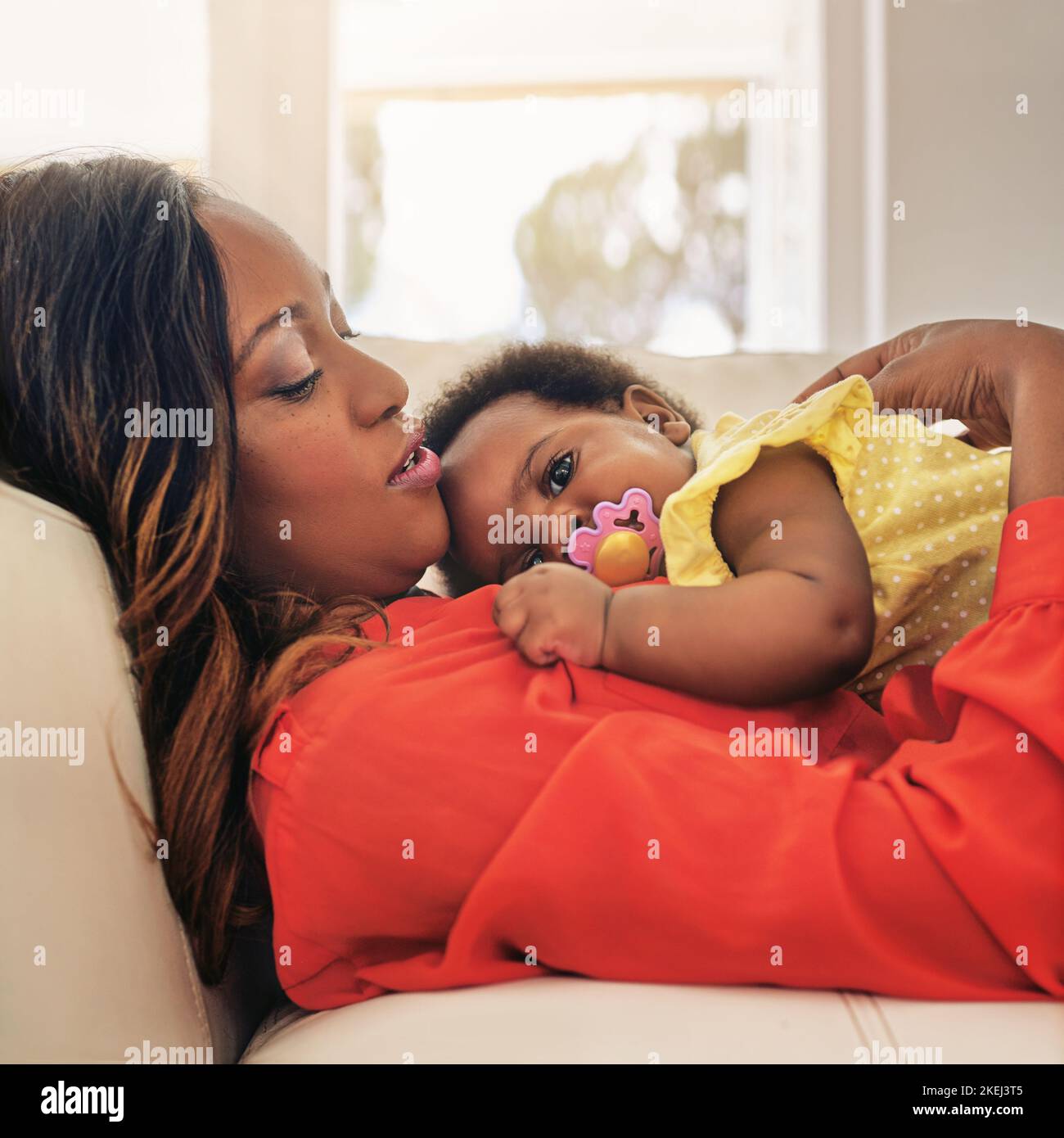 You are far more precious than jewels. a baby girl lying on her mothers