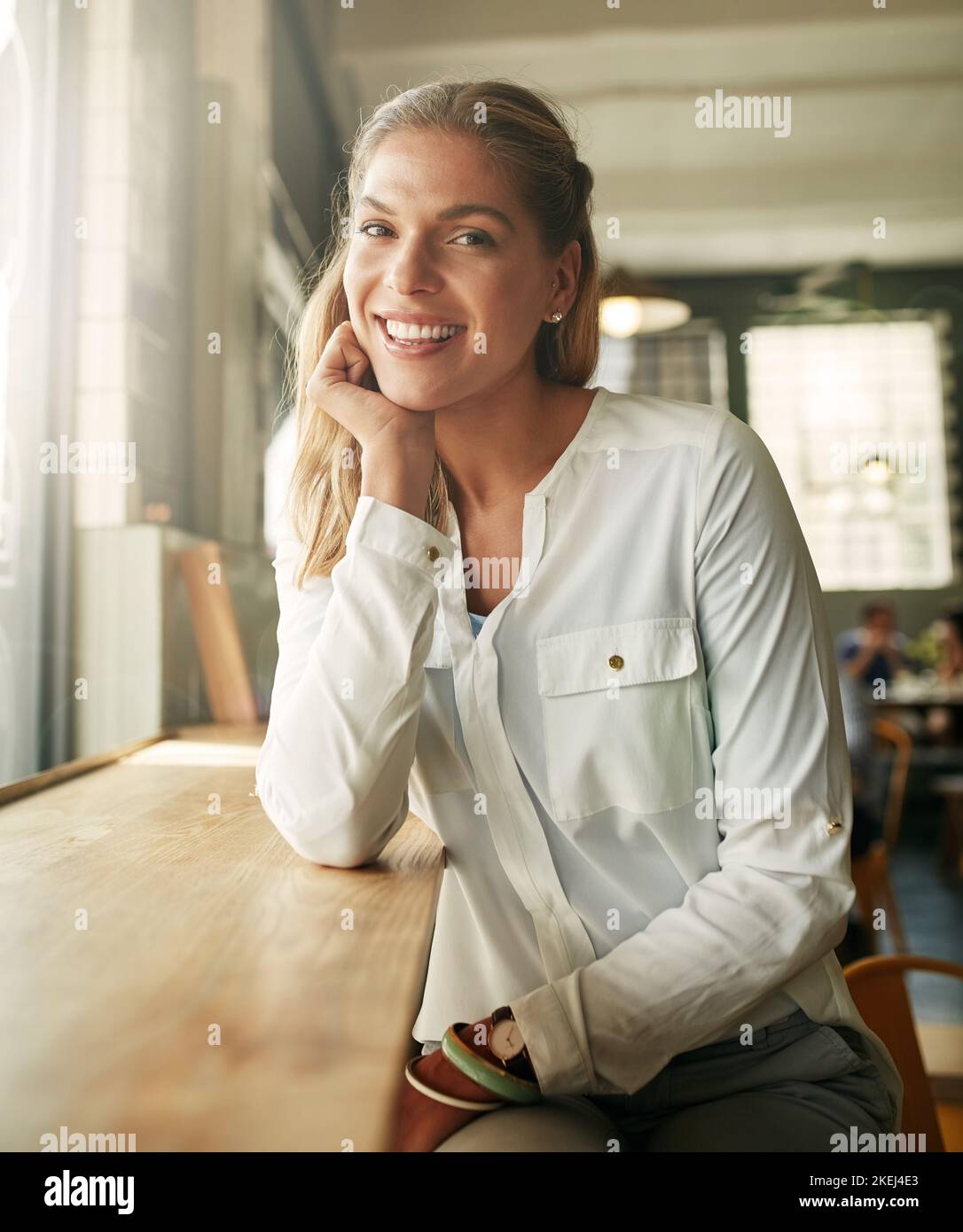The best coffee shop on the block. an attractive young woman in a