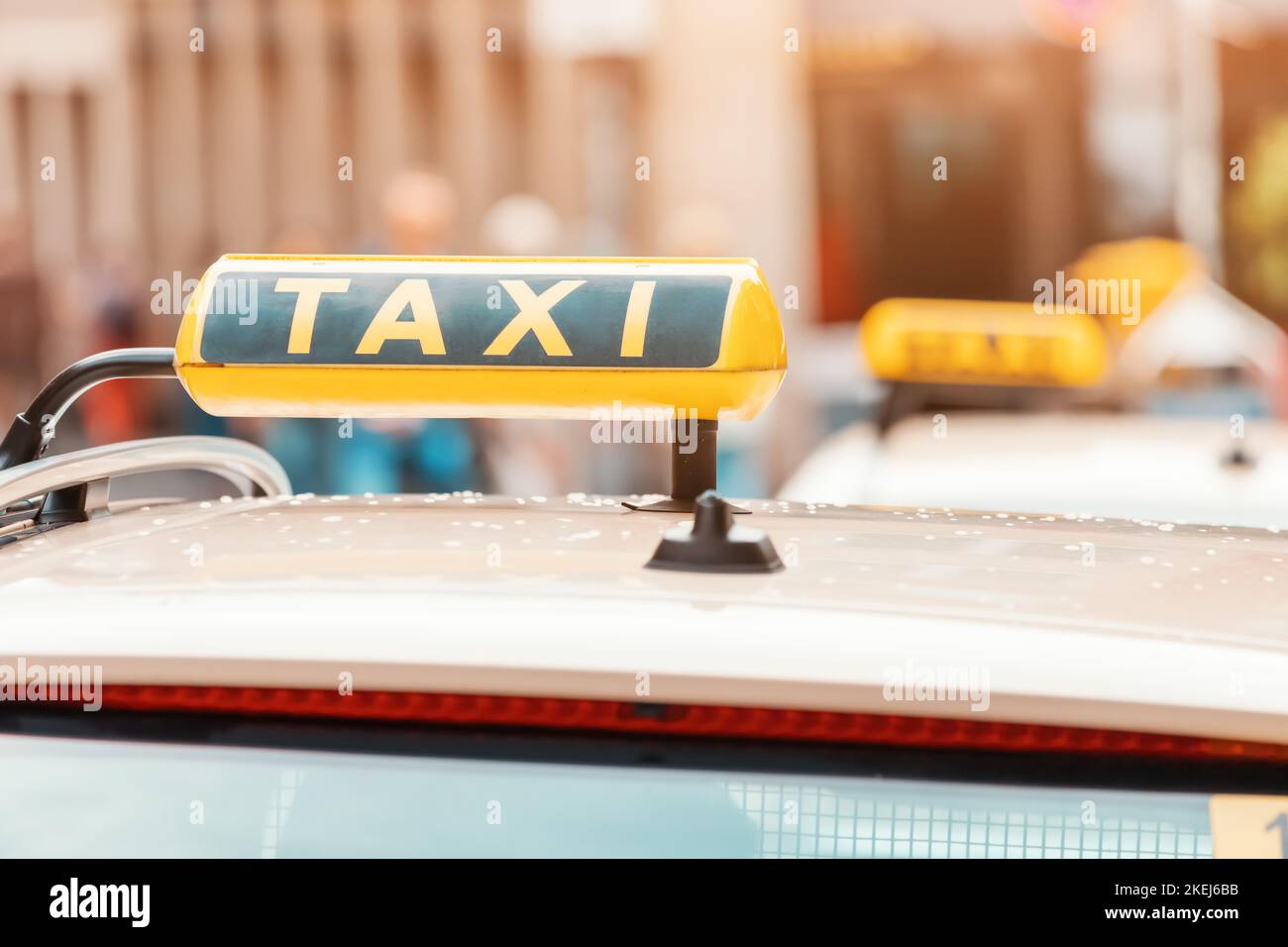 Taxi in the city as an individual transport. Mobility, traffic jams and prices for a trip via the smartphone app Stock Photo