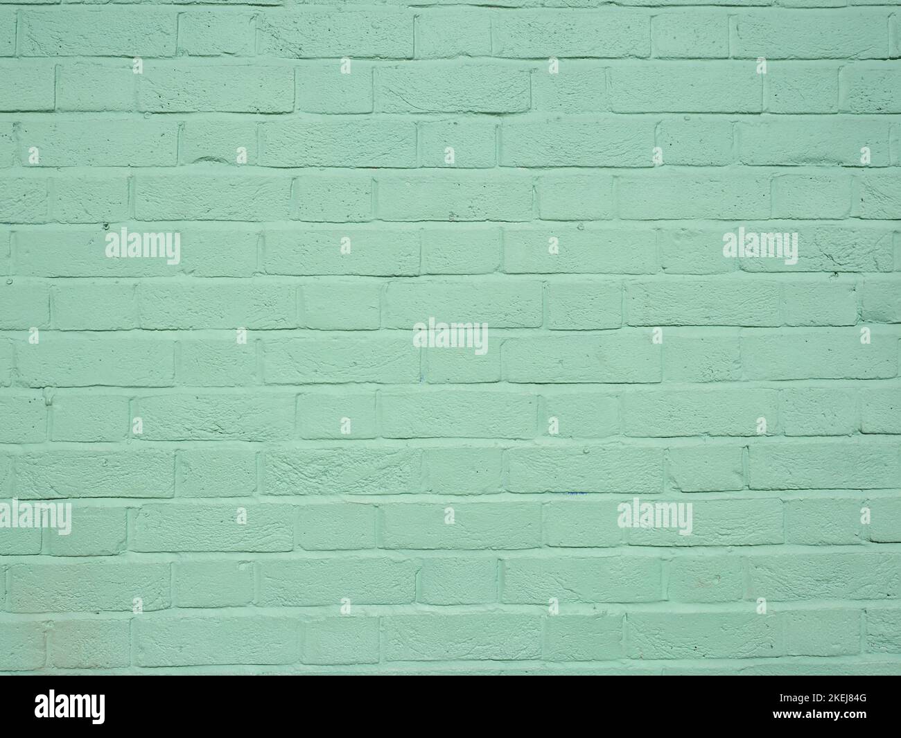 light green brick wall useful as a background Stock Photo - Alamy