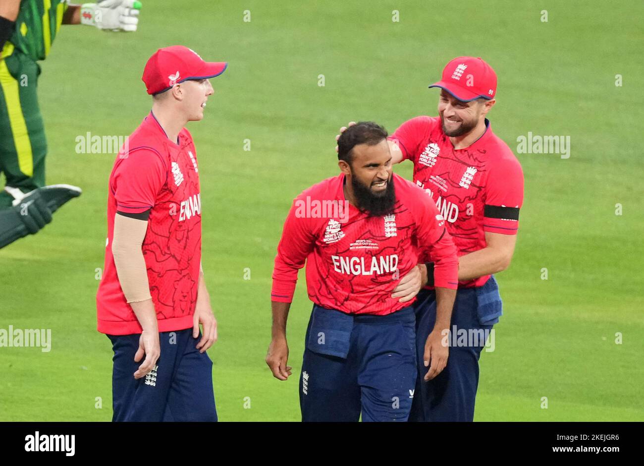England's Adil Rashid celebrates taking the wicket of Pakistan's Babar ...