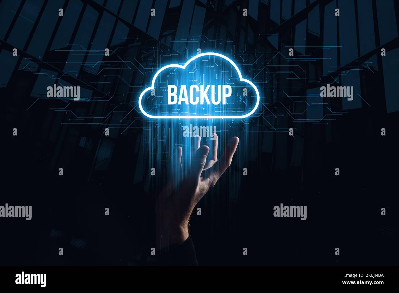 Data backup for data recovery to original or new location. Hologram in the form of a cloud over the hand Stock Photo