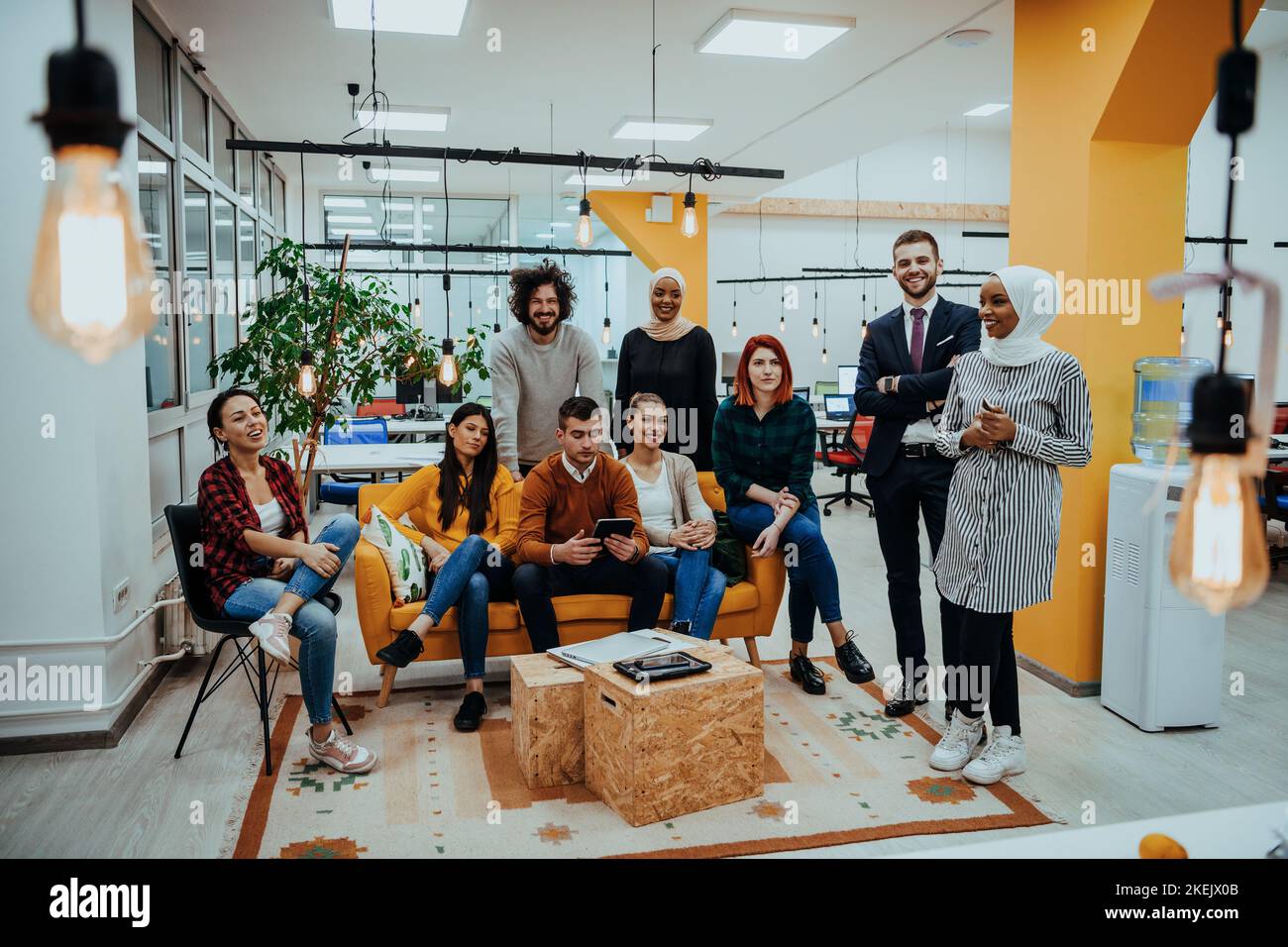 Group of multi-ethnic colleagues working on desktop computers, laptop ...