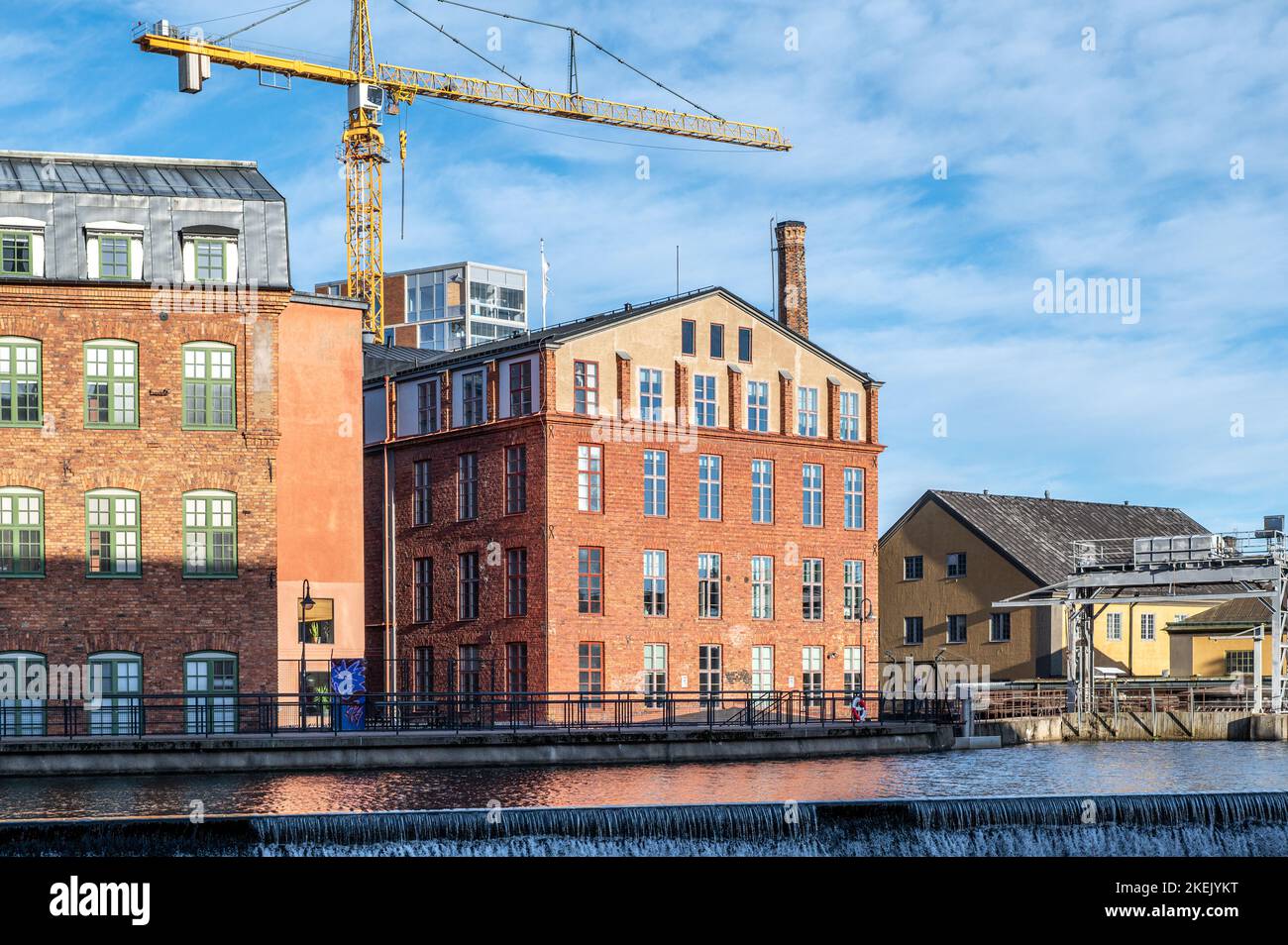 The old industrial landscape on a sunny November day. Norrkoping is a historic industrial town in Sweden. Stock Photo
