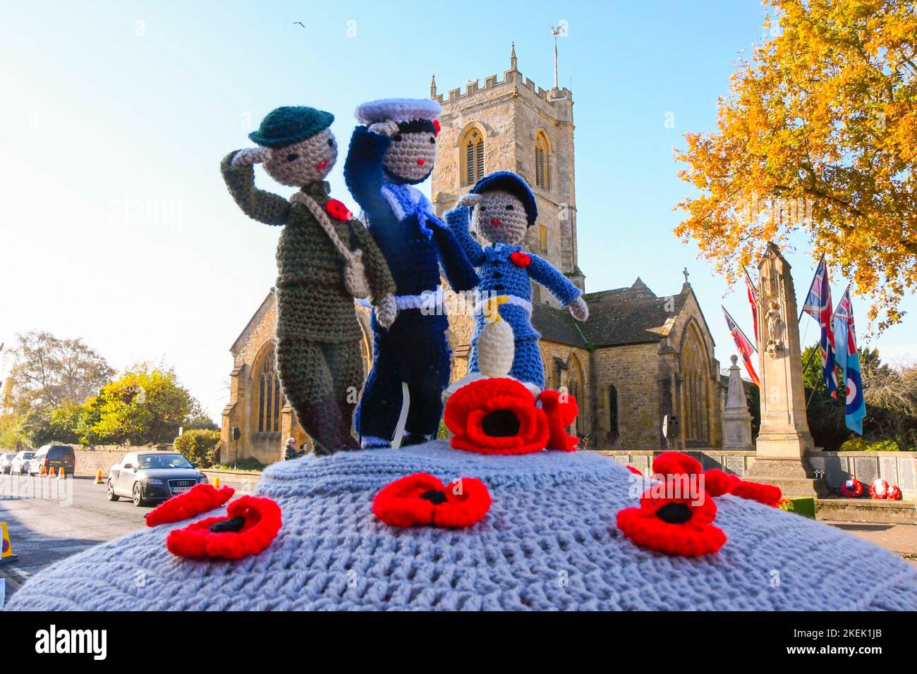 Bridport, Dorset, UK.  13th November 2022.  A crochet post box topper with servicemen in South Street at Bridport in Dorset ahead of the Remembrance Sunday service at the war memorial outside St Mary’s Church. Picture Credit: Graham Hunt/Alamy Live News Stock Photo