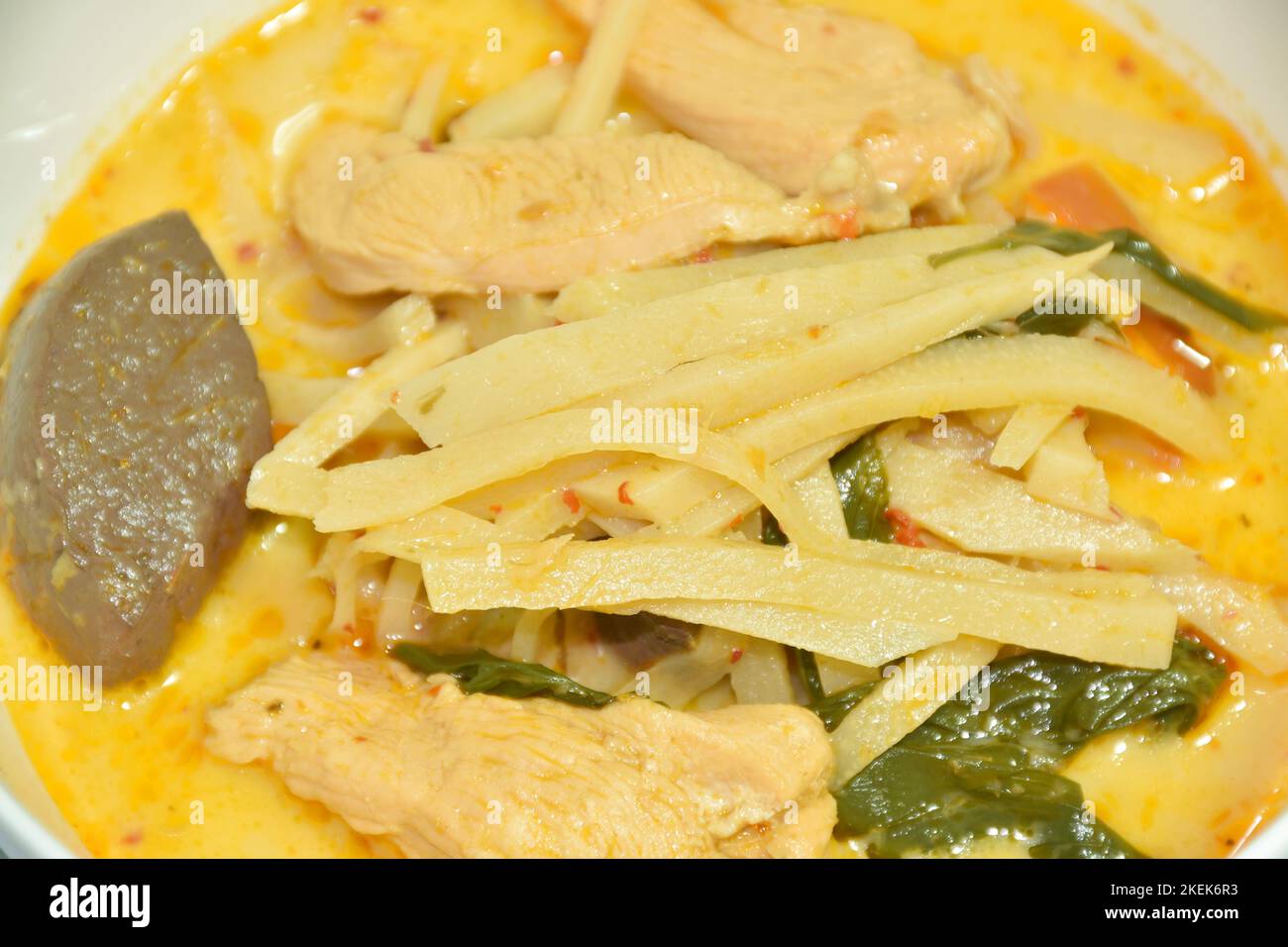spicy boiled slice fresh bamboo shoot with chicken and blood in coconut