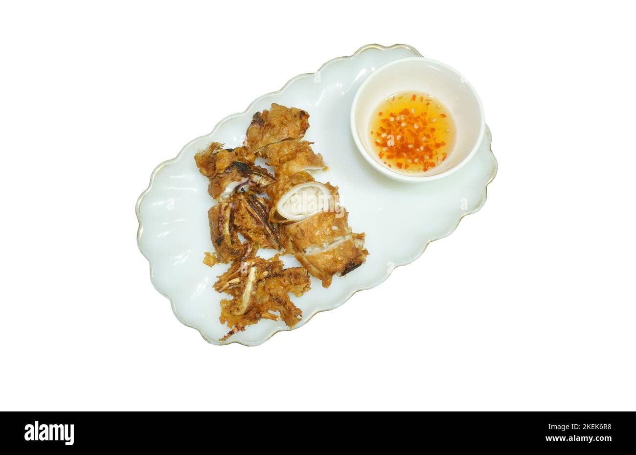 crispy fried squid stuffed flour dipping sweet chili sauce on plate