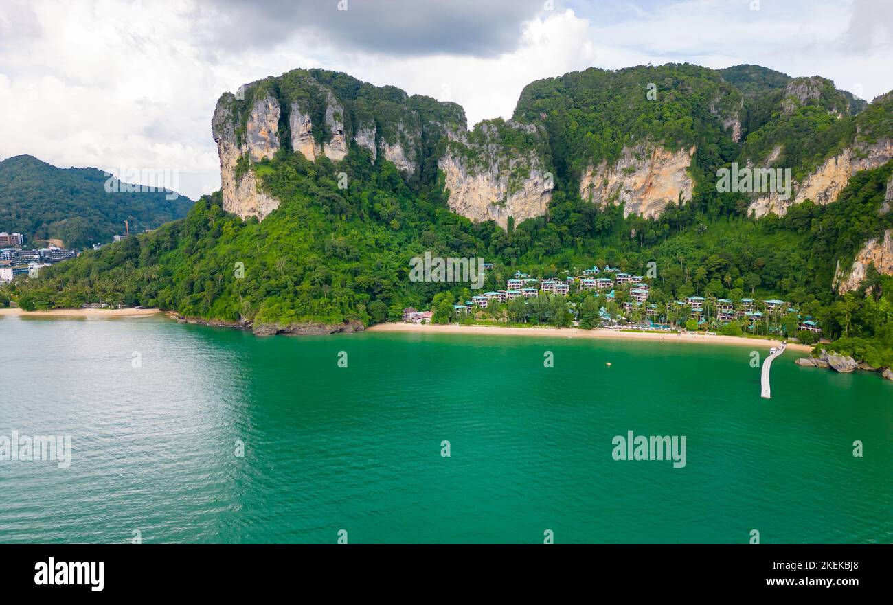 Ao Nang Tower, famous limestone rock near the Krabi town, Thailand. Aerial drone view to big rocks above turquoise sea. Exotic tourist destination. Stock Photo